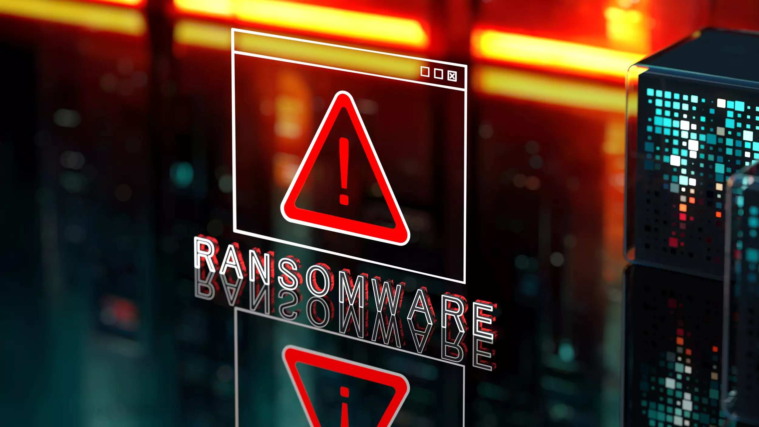 Ransomware warning screen with an exclamation mark icon reflected on a dark server room floor.